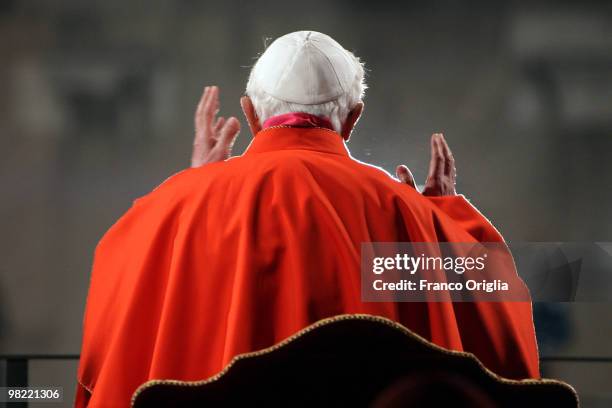 Pope Benedict XVI presides over the Way Of The Cross procession at the Colosseum on Good Friday on April 2, 2010 in Rome, Italy. The pontiff led the...