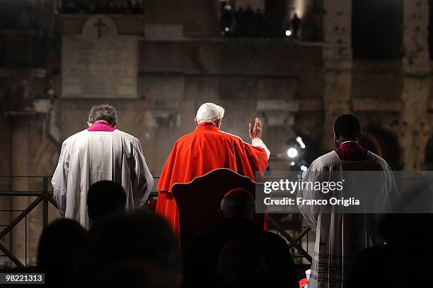 Pope Benedict XVI presides over the Way Of The Cross procession at the Colosseum on Good Friday on April 2, 2010 in Rome, Italy. The pontiff led the...