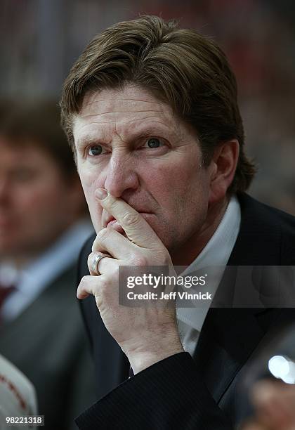 Head coach Mike Babcock of the Detroit Red Wings looks on from the bench during the game against the Vancouver Canucks at General Motors Place on...