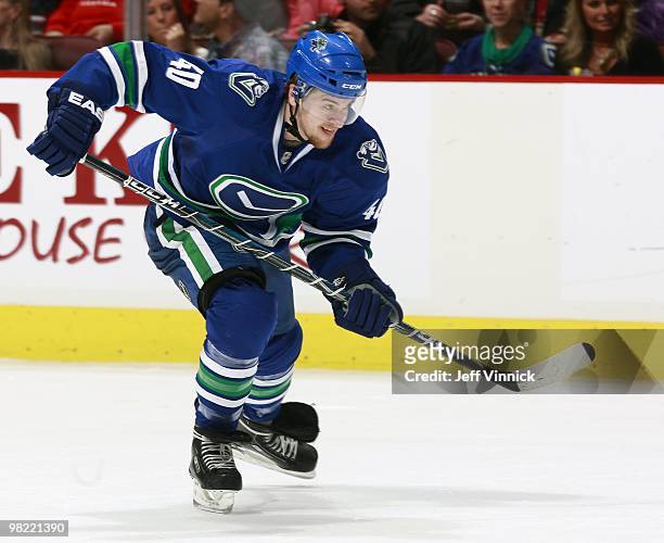 Michael Grabner of the Vancouver Canucks skates up ice during the game against the Detroit Red Wings at General Motors Place on March 20, 2010 in...
