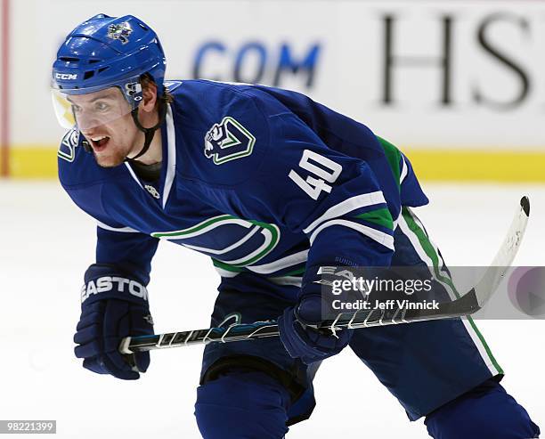 Michael Grabner of the Vancouver Canucks skates up ice during the game against the Detroit Red Wings at General Motors Place on March 20, 2010 in...