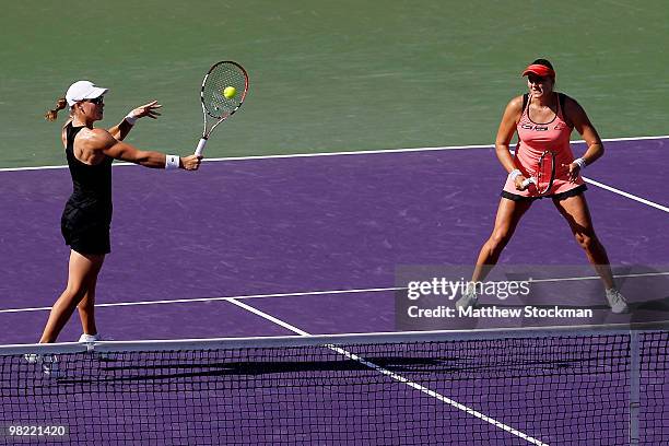 Samantha Stosur of Australia and Nadia Petrova of Russia play Yung-Jan Chan of Taipei and Jie Zheng of China during day eleven of the 2010 Sony...