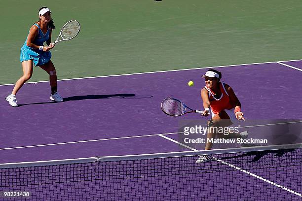 Jie Zheng of China and Yung-Jan Chan of Taipei play Samantha Stosur of Australia and Nadia Petrova of Russia during day eleven of the 2010 Sony...