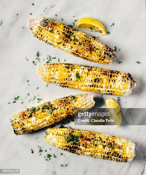 grilled corn - corn on the cob stock pictures, royalty-free photos & images