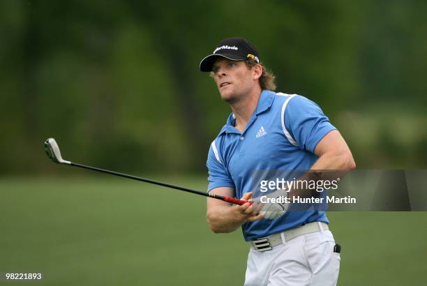 James Driscoll watches his second shot on the eighth hole during the second round of the Shell Houston Open at Redstone Golf Club on April 2, 2010 in...