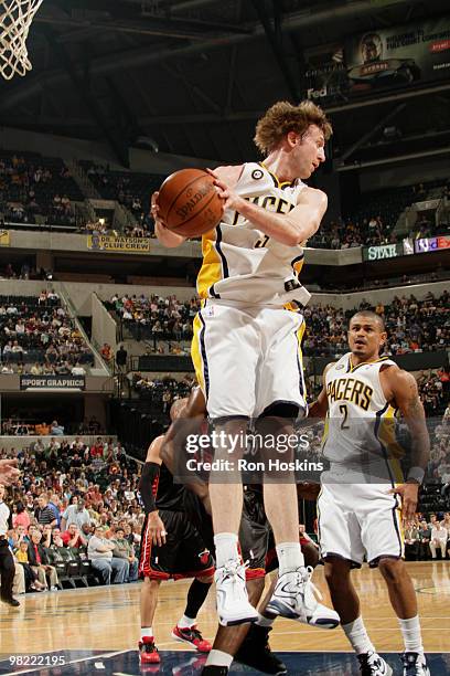 Troy Murphy of the Indiana Pacers brings down a rebound against the Miami Heat at Conseco Fieldhouse on April 2, 2010 in Indianapolis, Indiana. NOTE...