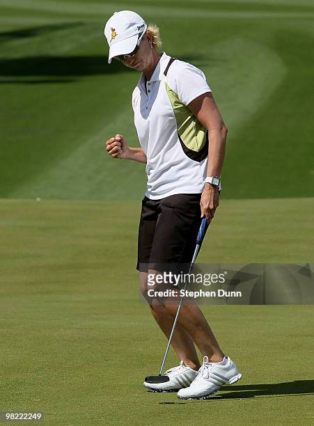 Karrie Webb of Australia pumps her fist making a birdie putt on the tenth hole during the second round of the Kraft Nabisco Championship at Mission...