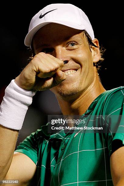 Tomas Berdych of the Czech Republic celebrates match point against Robin Soderling of Swedenduring day eleven of the 2010 Sony Ericsson Open at...