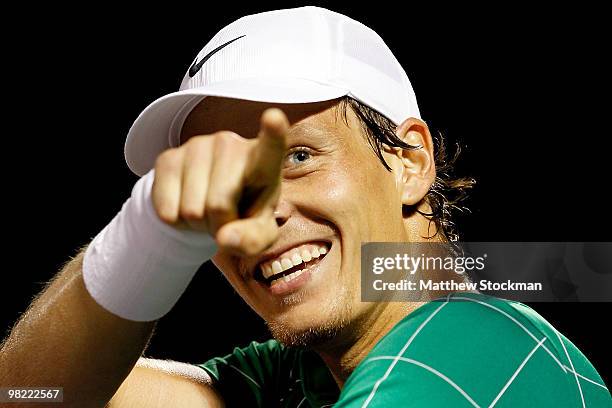 Tomas Berdych of the Czech Republic celebrates match point against Robin Soderling of Swedenduring day eleven of the 2010 Sony Ericsson Open at...