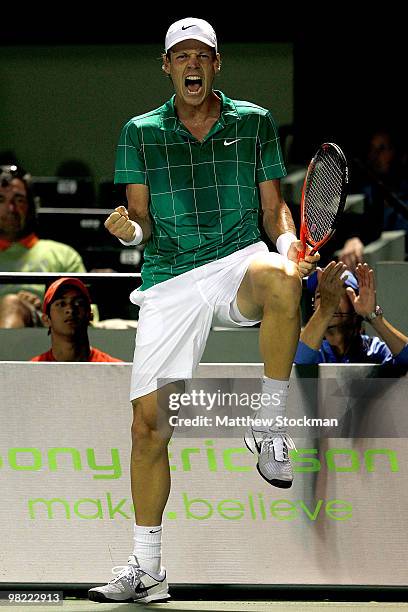 Tomas Berdych of the Czech Republic celebrates a point against Robin Soderling of Sweden in the second set during day eleven of the 2010 Sony...