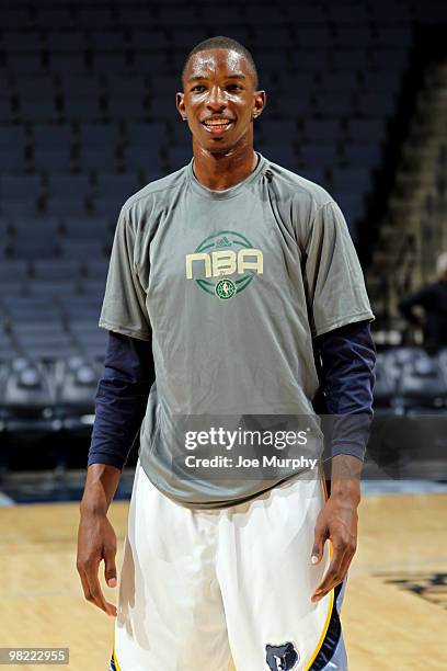 Hasheem Thabeet of the Memphis Grizzlies smiles as he wears his NBA Green Week t-shirt before a game the New Orleans Hornets on April 02, 2010 at...