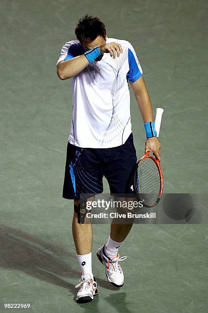 Robin Soderling of Sweden wipes his forehead between points against Tomas Berdych of the Czech Republic during day eleven of the 2010 Sony Ericsson...