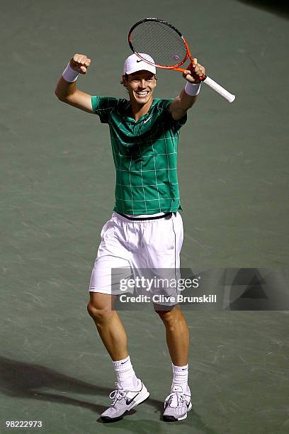 Tomas Berdych of the Czech Republic celebrates match point against Robin Soderling of Sweden during day eleven of the 2010 Sony Ericsson Open at...