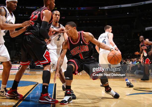 Derrick Rose of the Chicago Bulls drives against Shaun Livingston of the Washington Wizards at the Verizon Center on April 2, 2010 in Washington, DC....