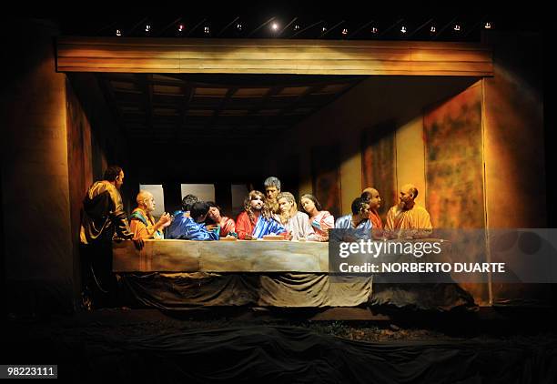 Paraguayan artists make a tableau vivant of the painting by Italian Renaissance master Leonardo Da Vinci's 'The Last Supper', in Misiones, a city...