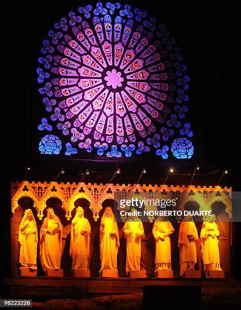 Paraguayan artists make a tableau vivant of the Jesuits' art, in Misiones, a city some 225 km south of Asuncion, during Good Friday on April 2, 2010....