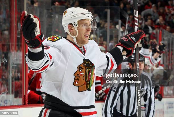 Kris Versteeg of the Chicago Blackhawks celebrates his game tying goal against the New Jersey Devils with 26 seconds left in the third period at the...