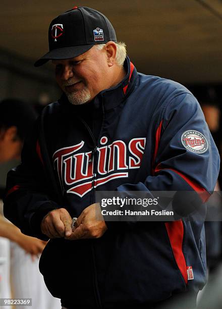 Manager Ron Gardenhire of Minnesota Twins in the dugout during an exhibition game against the St. Louis Cardinals at Target Field on April 2, 2010 in...