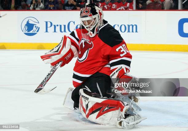 Martin Brodeur of the New Jersey Devils makes a save against the Chicago Blackhawks at the Prudential Center on April 2, 2010 in Newark, New Jersey....