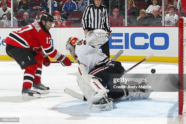 Antti Niemi of the Chicago Blackhawks stops Ilya Kovalchuk of the New Jersey Devils in the third round to secure the shootout victory at the...