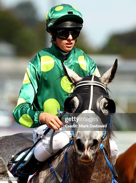 Jockey Billy Egan riding Zantelagh returns to scale after winning Race 3 the Bill Collins Handicap during Easter Cup Day at Caulfield Racecourse on...
