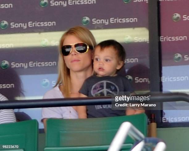 Tiger Woods' wife Elin Nordegren and their son Charlie are seen at Sony Ericsson Open on April 2, 2010 in Key Biscayne, Florida.