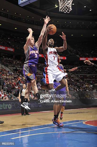 Ben Gordon of the Detroit Pistons goes up for a shot attempt against Goran Dragic of the Phoenix Suns in a game at the Palace of Auburn Hills on...