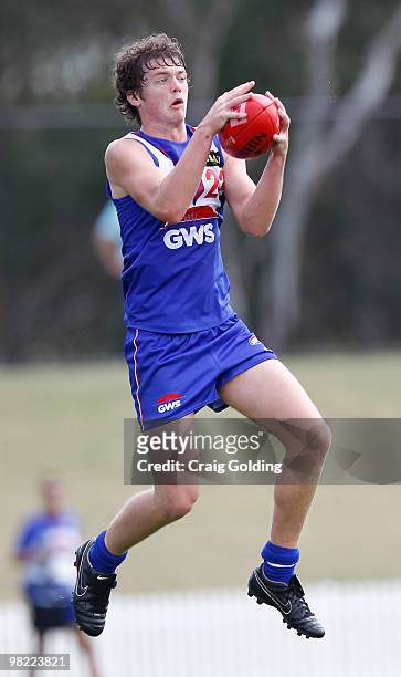 Jack Dimery of Greater Western Sydney takes a mark during the round two TAC Cup match between Greater Western Sydney and the Northern Knights at...