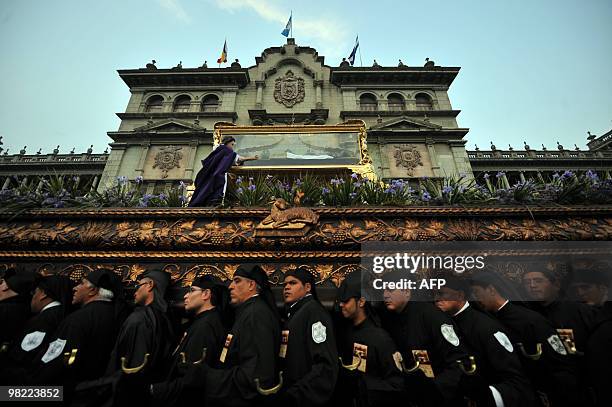 Catholic parishioners participate in the "Santo Entierro" procession on 02 April 2010, the church "Santo Domingo" in Guatemala city. Christians...