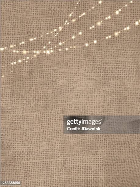 rustic burlap background with string lights - hessian stock illustrations