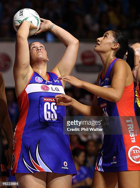 Catherine Latu of the Mystics shoots at goal with Maria Tutaia for support during the round three ANZ Championship match between the Mystics and the...