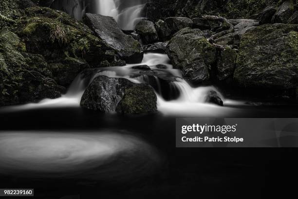 half torc waterfall - torc waterfall stock pictures, royalty-free photos & images