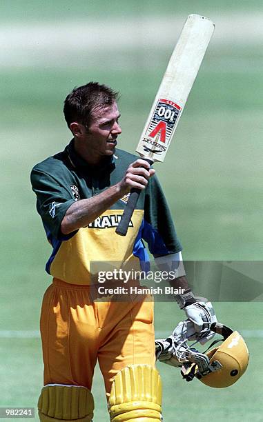 Damien Martyn of Australia leaves the field after scoring 144 not out against Zimbabwe during the Carlton Series One Day International between...