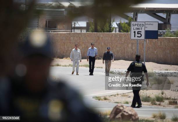 Rep. Tom Suozzi , Rep. Beto O'Rourke and Rep. Joaquin Castro exit together after touring the tent encampment recently built near the...