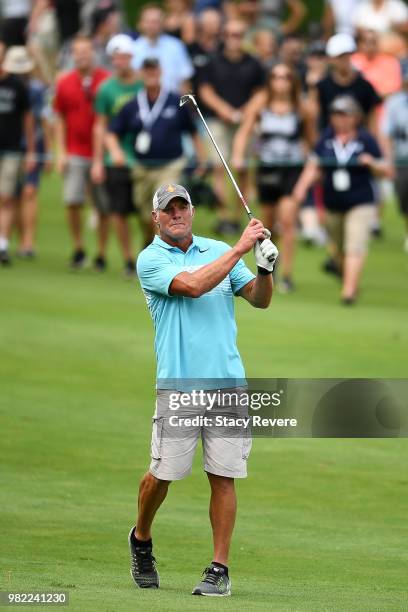 Former NFL player Brett Favre hits his second shot on the 18th hole at the conclusion of the Celebrity Foursome during the second round of the...