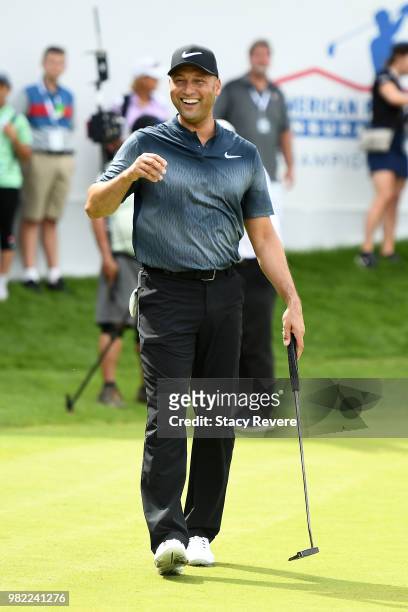 Former Major League Baseball player Derek Jeter walks across the 18th green at the conclusion of the Celebrity Foursome during the second round of...
