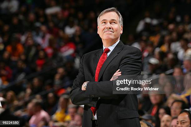 Coach Mike D'antoni of the New York Knicks checks the score board in a game against the Golden State Warriors on April 2, 2010 at Oracle Arena in...