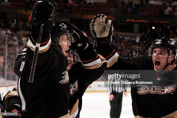 Bobby Ryan, Teemu Selanne and Saku Koivu of the Anaheim Ducks celebrate a third period goal against the Vancouver Canucks during the game on April 2,...