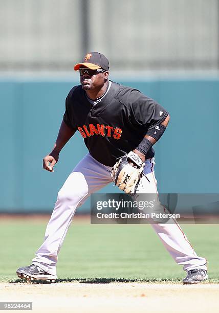 Infielder Juan Uribe of the San Francisco Giants in action during the MLB spring training game against the Oakland Athletics at Phoenix Municipal...