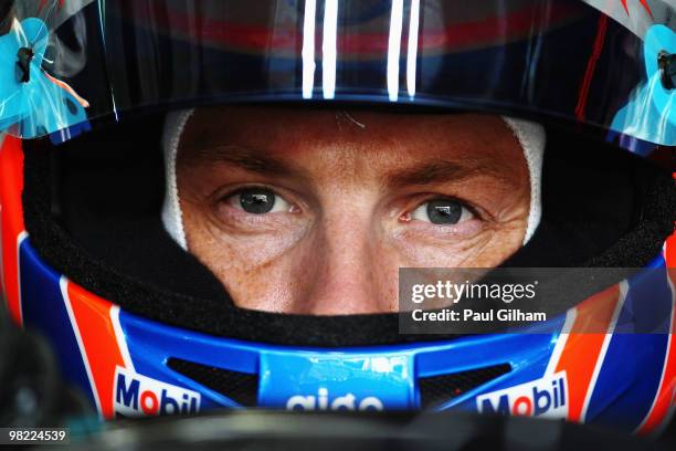 Jenson Button of Great Britain and McLaren Mercedes prepares to drive during qualifying for the Malaysian Formula One Grand Prix at the Sepang...