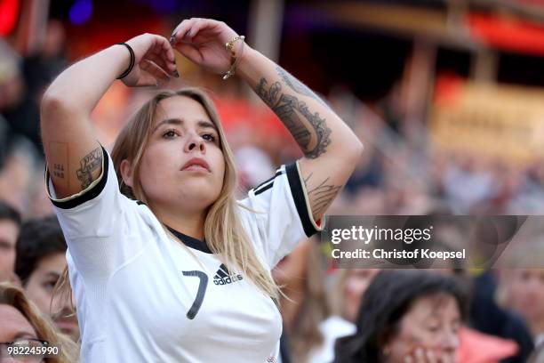 German fans as they watch the Germany national team play in their 2018 FIFA World Cup Russia match against Sweden at 11 Freunde - Die Fussball Arena...