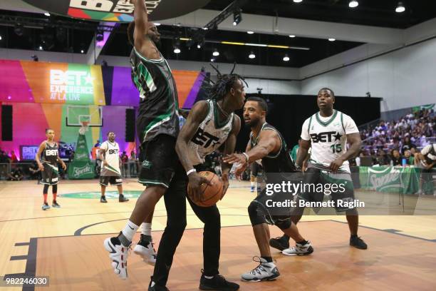 Travis Greene, Famous Dex, Christian Keyes, and Casanova play basketball at the Celebrity Basketball Game Sponsored By Sprite during the 2018 BET...