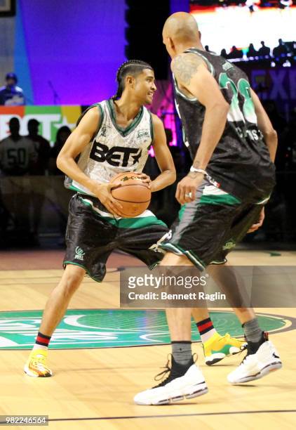 Kap G and Doug Christie play basketball at the Celebrity Basketball Game Sponsored By Sprite during the 2018 BET Experience at Los Angeles Convention...