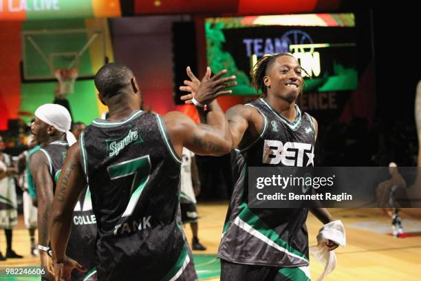 Tank and Lecrae dap at the Celebrity Basketball Game Sponsored By Sprite during the 2018 BET Experience at Los Angeles Convention Center on June 23,...