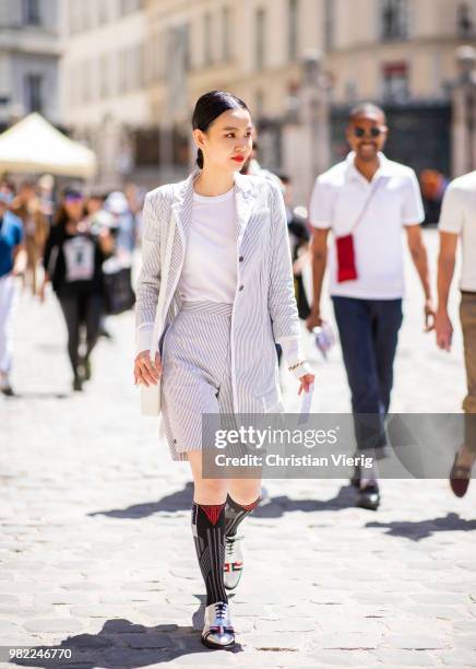 Sherry Shen is seen outside Thom Browne on day five of Paris Fashion Week Menswear SS19 on June 23, 2018 in Paris, France.