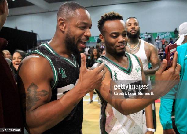 Tank and Travis Greene attend the Celebrity Basketball Game Sponsored By Sprite during the 2018 BET Experience at Los Angeles Convention Center on...