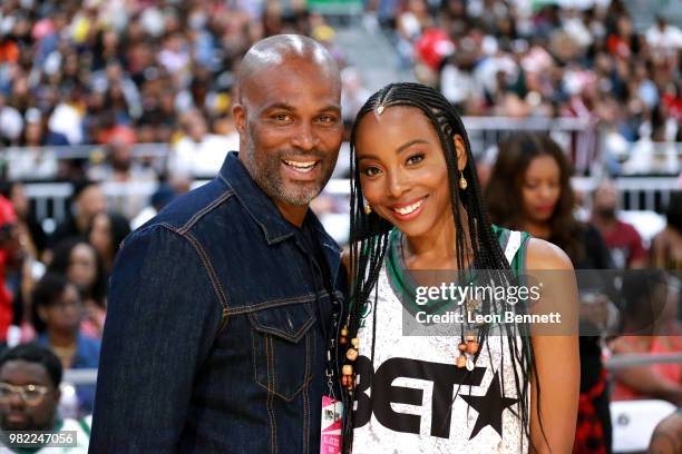 Chris Spencer and Erica Ash pose at the Celebrity Basketball Game Sponsored By Sprite during the 2018 BET Experience at Los Angeles Convention Center...