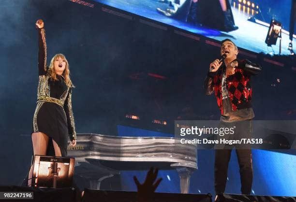 Taylor Swift performs with Robbie Williams on stage during the second date of the Taylor Swift reputation Stadium Tour at Wembley Stadium on June 23,...