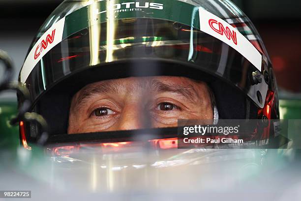 Jarno Trulli of Italy and Lotus prepares to drive in the final practice session prior to qualifying for the Malaysian Formula One Grand Prix at the...