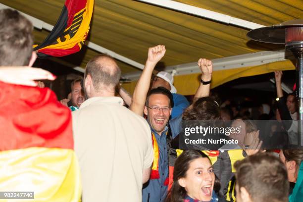 Fans celebrating the goal of Germany in the last second. German fans watched the match Germany Sweden 2-1, which Germany won in the last minute, of...